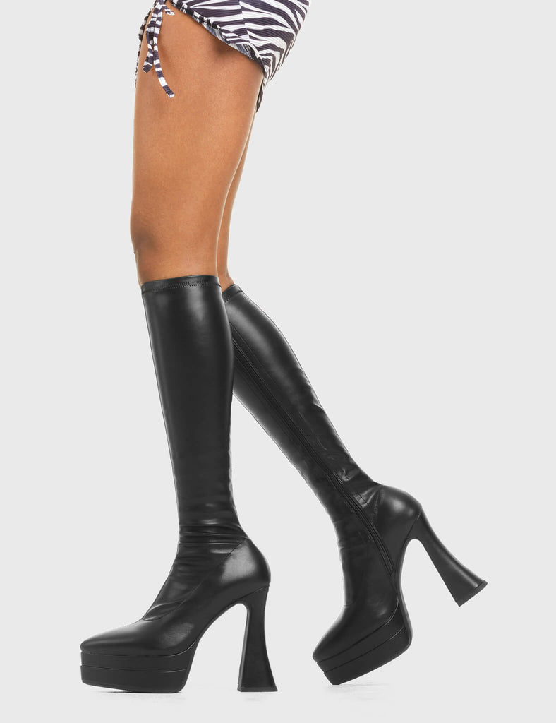 THESE BOOTS ARE MAKE FOR WALKING  Alter Ego Platform Knee High Boots in Black fitted faux leather. These platform boots feature a minimalist look with a flared heel. Made with eco-friendly materials and 100% cruelty-free, these platform boots are as ethical as they are chic.  - Platform Height - Fitted feel - Flared heel - Pointed toe - High Heel - 100% vegan  SKU: LMF 3532 - BlackPUStretch