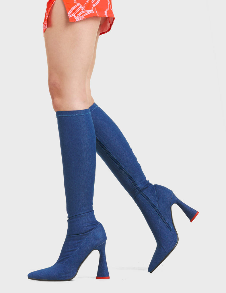 Big Dreams Knee High Boots feature a unique stretch denim design, with a heart shaped heel.
