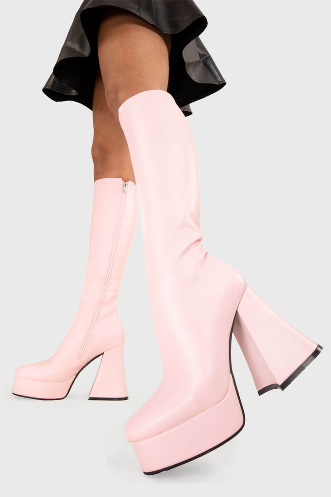Stylish Uplifts.
 
 Black Swan Platform Knee High Boots in Pink faux leather. These pink vegan Platform Boots feature on our platform sole, elevating your style and making a lasting impression. Made with eco-friendly materials and 100% cruelty-free, these platform boots are as ethical as they are stylish!
 
 
 - Platform Height: 2.6 inch
 - Heel Height: 5.5 inch
 - Pink zipper 
 - Chunky Platform sole
 - Flared heel
 - Round Toe
 - 100% vegan 
 
 SKU: LMF 1806 - PinkPU