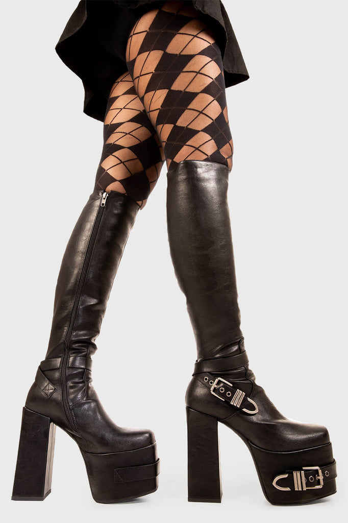 Savage Soles 

Blair Wide Calf Platform Knee High Boots in Black faux leather. These black vegan Platform Boots feature on our chunky platform sole with a adjustable buckle on the heel and on the side of the boot, embracing the edge. Made with eco-friendly materials and 100% cruelty-free.

- Platform Height: 2.5 inch
- Heel Height: 5.5 inch 
- Wide fit
- Black zipper 
- Black strap and silver eyelets
- Square shaped buckles 
- Chunky Platform sole
- Round Toe
- 100% vegan 

SKU: LMF 1899 - BlackPU"
