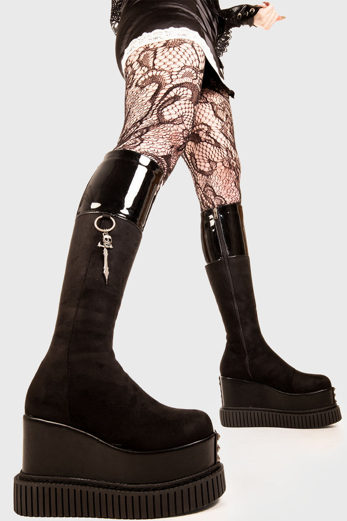 Sky High Soles
 
 Communication Breakdown Chunky Platform Knee High Boots in Black suede. These black vegan Platform Boots feature a black patent finish at the top of the boot with a silver hanging cross and skull, amplify your attitude. Made with eco-friendly materials and 100% cruelty-free.
 
 - Platform Height: 5.3 inch
 - Black zipper 
 - Black patent finsh 
 - Silver hanging cross and skull
 - Chunky flatform creeper sole
 - Round Toe
 - 100% vegan 
 
 SKU: LMF 1882 - BlackPAT/SUEDE