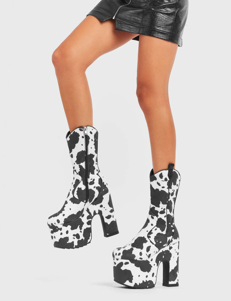 RINGING MEW

Cowbell Chunky Platform Calf Boots in Cow Print faux suede. These vegan Platform Boots feature an ICONIC western cow print on a Chunky Platform sole and heel, the only choice for festival goers. Made with eco-friendly materials and 100% cruelty-free, these boots are as ethical as they are wild!


- Platform Height: 
- Heel Height:
- Cowprint Design
- Calf Length 
- Black Zipper
- Western Neck
- Platform Sole
- Pointed Toe
- 100% vegan

SKU: LMF 4921 - Cowprint