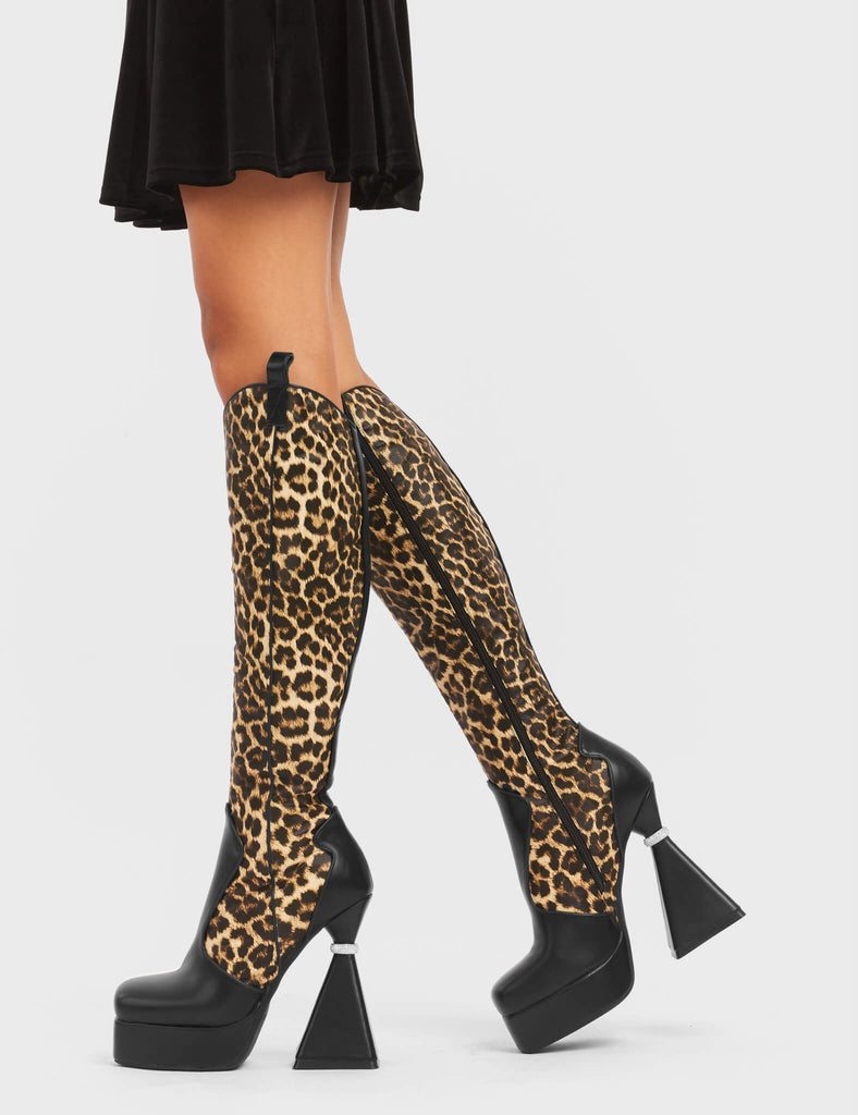 UNFORGETTABLE

Curious Platform Knee High Boots in black and leopard faux leather. These platform boots feature a chic look with a flared heel that includes silver ring detailing on the heel, keeping it nice and classy. These heels also feature a functional zip on the leopard detailed upper. Made with 100% vegan materials. 

- Platform Height
- Leopard Design
- Functional Zip
- Flared Heel
- Silver Ring Detail
- Round Toe
- 100% vegan

SKU: LMF 5442 - BlackPU/Leo