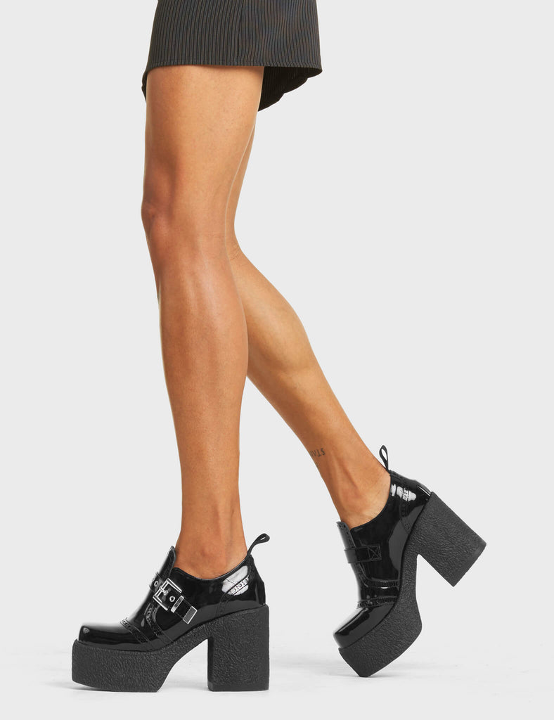 TOO BUSY
 
 Don't Call Chunky Platform Shoes, in Black Faux Leather. These vegan western Boots feature a brogued silhouette and a chunky platform sole, very classy. Also features a adjustable strap with a silver square shaped buckle. Made with eco-friendly materials and 100% cruelty-free, these boots are as ethical as they are edgy!
 
 
 - Chunky Platform
 - Brogued 
 - Sqaure Toe 
 - Adjustable Strap
 - Silver Buckle
 - Silver Eyelets
 - 100% vegan 
 
 SKU: LMF 4089 - BlackPAT