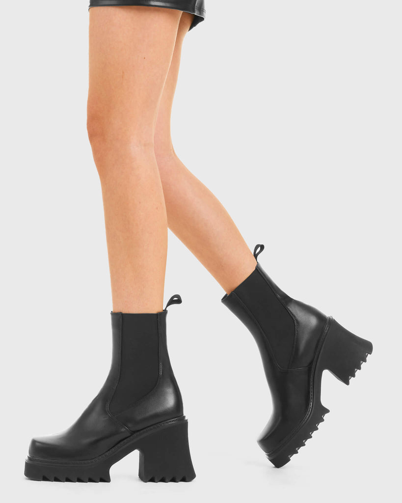 THESE BOOTS ARE MADE FOR WALKING
 
 Elevate Chunky Platform Ankle Boots in Black faux leather. These vegan western Boots feature a black gusset and a shark teeth grip sole, very chic. Made with eco-friendly materials and 100% cruelty-free, these boots are as ethical as they are edgy!
 
  
 - Chunky Platform
 - Calf length
 - Shark teeth grip
 - Black gusset
 - Rounded toe 
 - 100% vegan 
 
 SKU: LMF 3728 - BlackPU