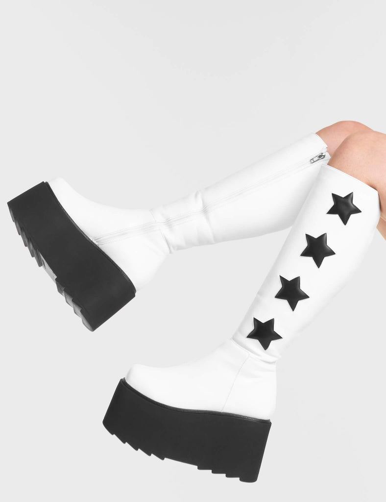 Extraterrestrial Platform Knee High Boots in White. These Platform Knee High Boots feature Black Stars.