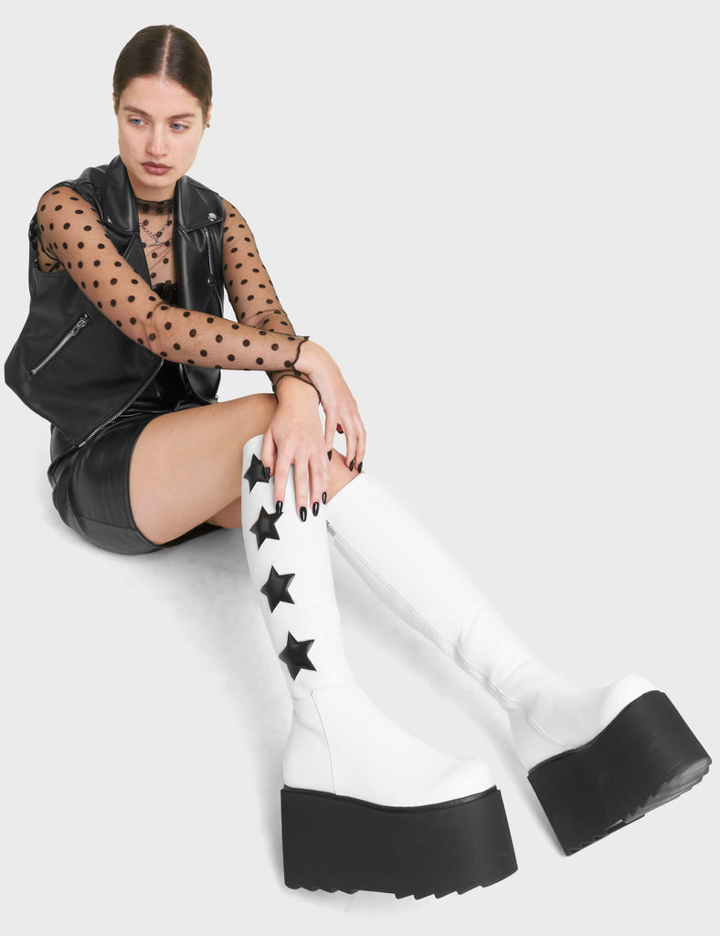 Extraterrestrial Platform Knee High Boots in White. These Platform Knee High Boots feature Black Stars.
