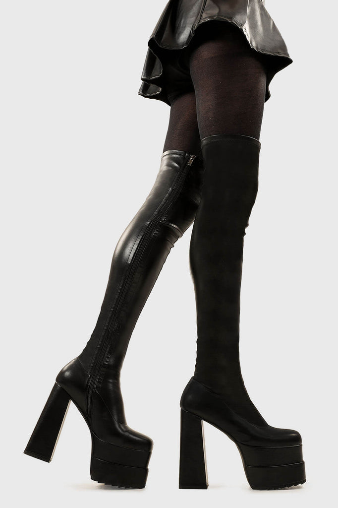 Ground Breaking
 
 Fantasies Platform Thigh High Boots in Black Stretch faux leather. These platform boots feature on our double stack platform sole, leave them with a lasting impression. Made with eco-friendly materials and 100% cruelty-free, these platform boots are as ethical as they are Ground Breaking!
 
 - Platform Height
 - Heel Height
 - Black Zip 
 - Thigh high length
 - Shark's teeth grip
 - Chunky Platform sole
 - Round Toe 
 - 100% vegan 
 
 SKU: LMF 2698 - BlackPU