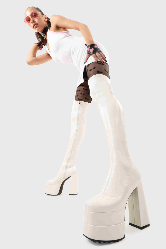 Ground Breaking

Fantasies Platform Thigh High Boots in White Stretch faux leather. These platform boots feature on our double stack platform sole, leave them with a lasting impression. Made with eco-friendly materials and 100% cruelty-free, these platform boots are as ethical as they are Ground Breaking!

- Platform Height
- Heel Height
- White Zip 
- Thigh high length
- Shark's teeth grip
- Chunky Platform sole
- Round Toe 
- 100% vegan 

SKU: LMF 2698 - WhitePU