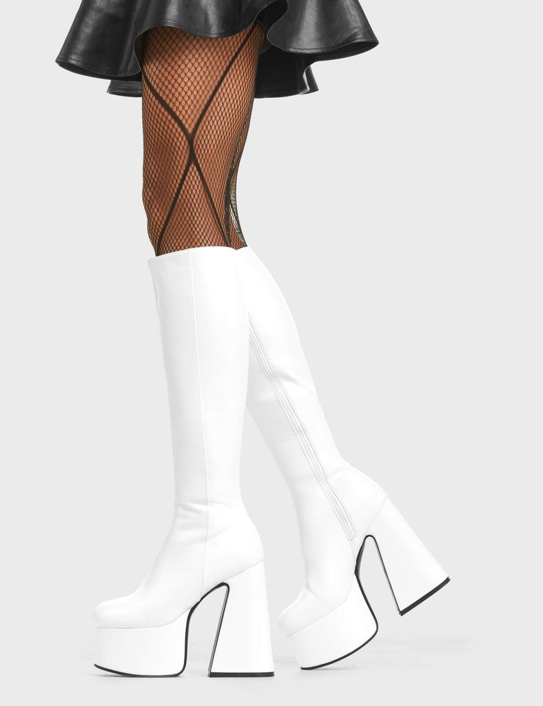 Hate You Platform Knee High Boots in White faux leather. Feature a minimalist design with a flared heel.