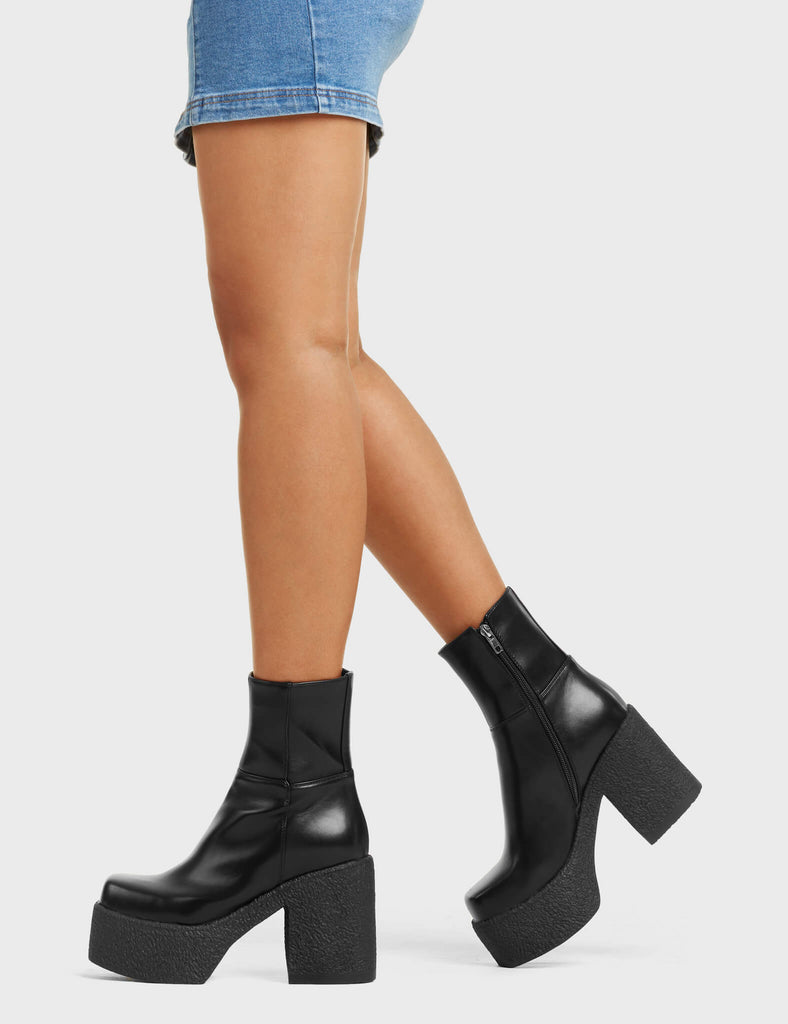 I Gotta Feeling Chunky Platform Ankle Boots in Black. These Ankle Boots feature a square toe and a Zip on the inside of the Boots.