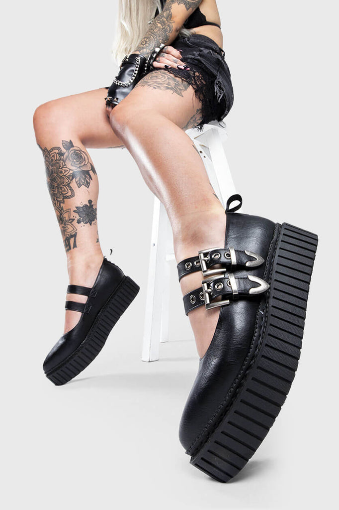 Believer Bling 
 
 I'm a Believer Chunky Platform Creeper Shoes in Black. These vegan Creeper Shoes feature two adjustable chunky stap with silver eyelets, stepping into believer brilliance. Made with eco-friendly materials and 100% cruelty-free, these Creeper shoes are as ethical as they are a Bling Bombshell!
 
 - Platform Height: 2.2 inch
 - Double adjustable strap
 - Silver eyelets
 - Chunky sole
 - Pointed toe
 - 100% vegan 
 
 SKU: LMF 1426 - BlackPU