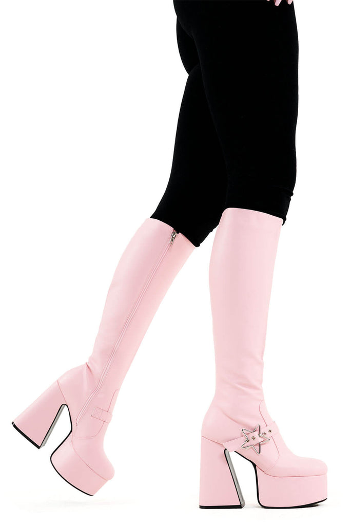 KEEPING IN CUTE
 
 I'm Your Star Platform Knee High Boots in Pink faux leather. These platform boots feature a minimalist look with a silver star buckle. Made with eco-friendly materials and 100% cruelty-free, these platform boots are as ethical as they are chic.
 
 - Platform Height
 - Knee high 
 - Silver star buckle
 - Flared heel
 - High Heel
 - 100% vegan 
 
 SKU: LMF 3359 - PinkPU