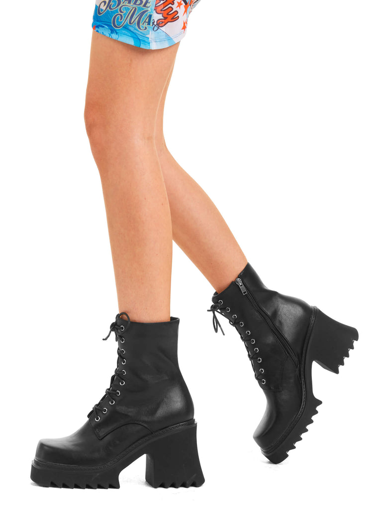 ON A HIGH
 
 In Opposition Chunky Platform Ankle Boots in Black faux leather. These vegan western Boots feature black laces and a shark teeth grip sole, very chic. Made with eco-friendly materials and 100% cruelty-free, these boots are as ethical as they are edgy!
 
  
 - Chunky Platform
 - Calf length
 - Shark teeth grip
 - Black laces
 - Rounded toe 
 - 100% vegan 
 
 SKU: LMF 3729 - BlackPU