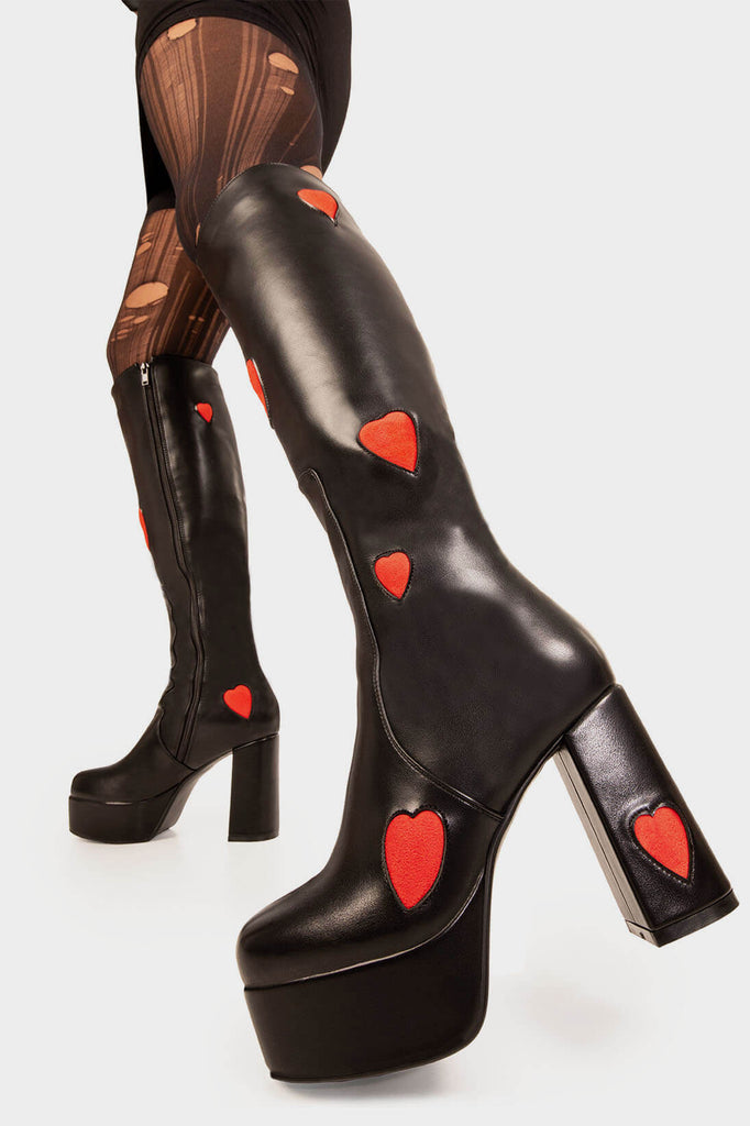 THE ONE FROM INSTA'

Jam Tarts Platform Knee High Boots in Black faux leather. These Black vegan Boots feature our ICONIC Red faux suede hearts and Platform sole and heel, perfect for adding height and style to any outfit. Made with eco-friendly materials and 100% cruelty-free, these boots are as ethical as they are cute!


- Platform Height: 1.25 inch
- Heel Height: 4.2 inch
- Knee High length
- Red Hearts
- Black zipper 
- Platform sole
- Round Toe
- 100% vegan 

SKU: LMF 0916 - Black/RedHeart