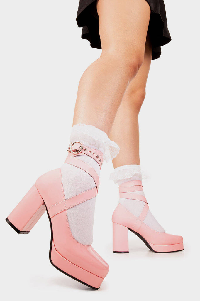 Sweet Soles

Listen More Platform Heels in Pink Patent faux leather. These pink Platform Heels feature an adjustable wrap around the ankle strap with 'O' ring buckle and silver eyelets, embrace the sweetness and comfort. Made with eco-friendly materials and 100% cruelty-free, these platform boots are as ethical as they are Sweet. It is recommended to size up. 

- Platform Height
- Heel Height
- Adjustable straps with silver eyelets
- 'O'ring shaped buckles
- Platform sole
- Square Toe 
- 100% vegan 