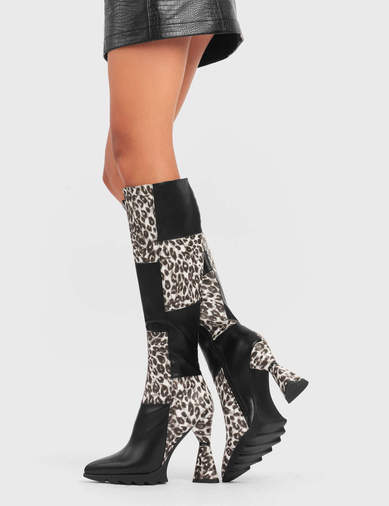 50ml LOVER

Love Shot Platform Knee High Boots in black and leopard faux leather. These platform boots feature a flared heel that includes black ring detailing on the heel, keeping it nice and classy. These heels also feature a heart shaped heel with a black heart at the bottom, in addition to a functional zip on the leopard detailed upper. Made with 100% vegan materials.

- Platform Height
- Leopard Design
- Functional Zip
- Heart Heel
- Black Heart
- Round Toe
- 100% vegan

SKU: LMF 5414 - BlackPU/Leo