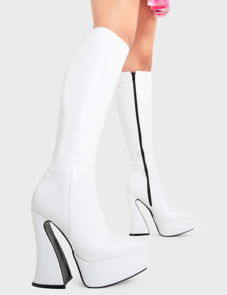 Smashing The Game
 
 Money Moves Platform Knee High Boots in White faux leather. These white platform boots feature on our platform sole with a western style curved heel, levelling up one step at a time. Made with eco-friendly materials and 100% cruelty-free, these platform boots are as ethical as they are SMASHING!
 
 - Platform Height
 - Heel Height
 - Black Zip
 - Platform sole
 - Round Toe 
 - 100% vegan 
 
 SKU: LMF 2348 - WhitePU