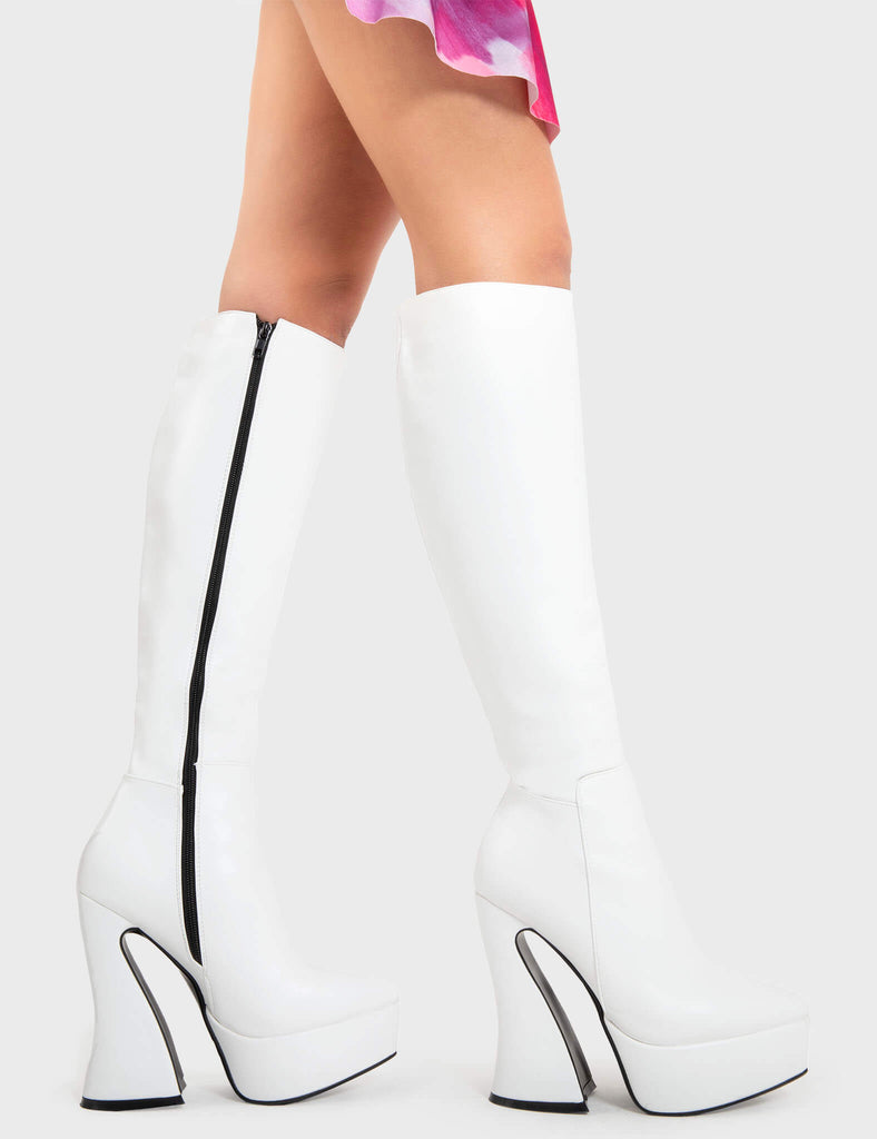 Smashing The Game
 
 Money Moves Platform Knee High Boots in White faux leather. These white platform boots feature on our platform sole with a western style curved heel, levelling up one step at a time. Made with eco-friendly materials and 100% cruelty-free, these platform boots are as ethical as they are SMASHING!
 
 - Platform Height
 - Heel Height
 - Black Zip
 - Platform sole
 - Round Toe 
 - 100% vegan 
 
 SKU: LMF 2348 - WhitePU