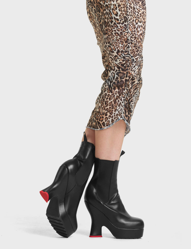 No Comment Chunky Platform Ankle Boots in Black. Featuring a stretchy gusset and a heart shaped heel.