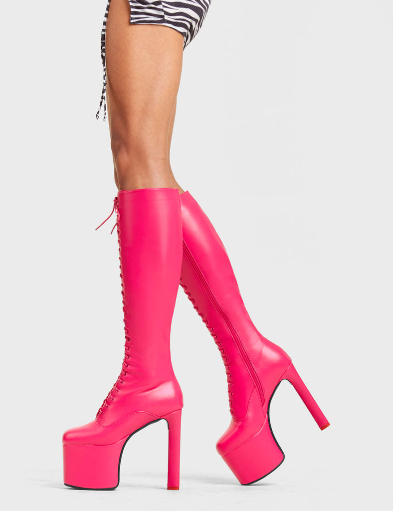 TRACKSTAR

Nowhere To Run Platform Knee High Boots in Fuchsia faux leather. These platform boots feature a stylish look with a heart shaped heel with a red heart at the bottom. These boots also feature lace up design across the entire upper of the boots. Made with 100% Vegan materials.

- Platform Height 
- Knee High Length 
- Heart Shaped Heel
- Red Heart Detail
- Red Heart Detail 
- Lace Up Design 
- Black Zip 
- High Heel 
- 100% Vegan 

SKU: LMF 4648 - FuchsiaPU