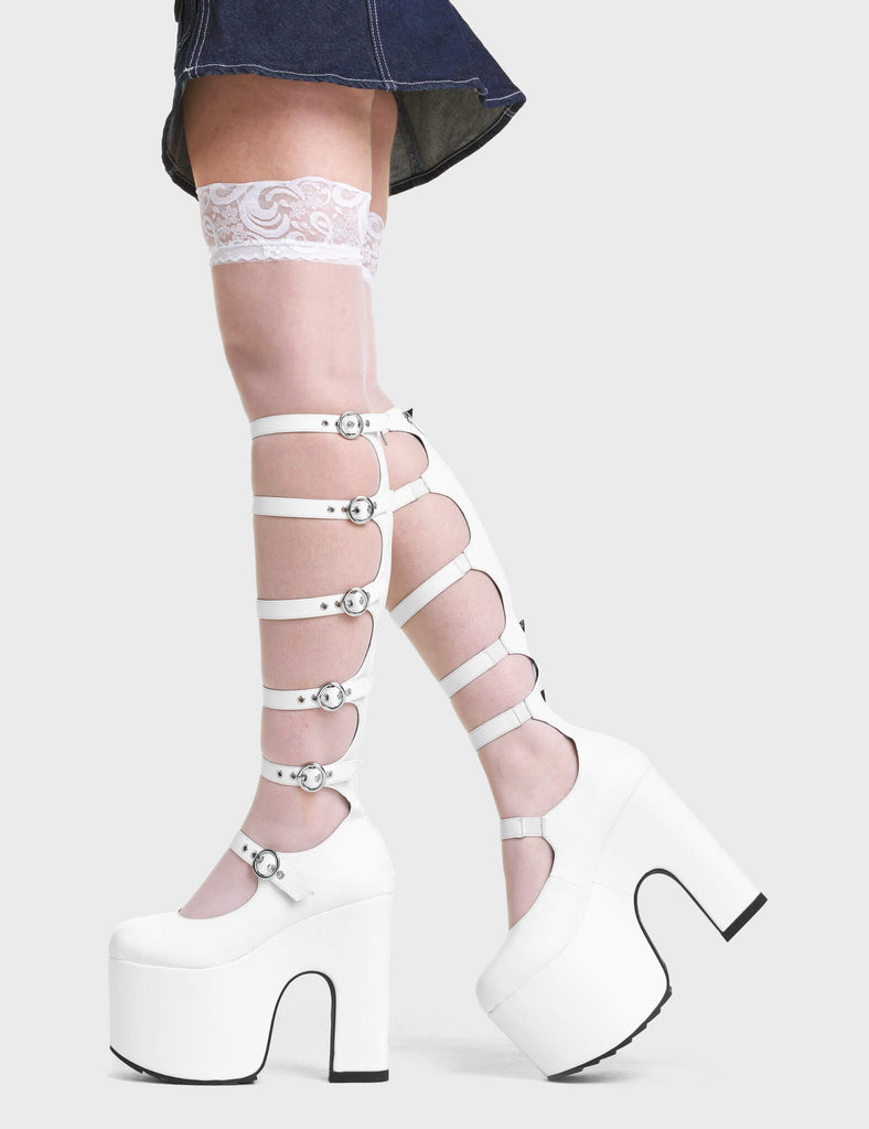 On A Loop Chunky Platform Knee High Boots. These Platform Knee High Boots feature adjustable straps with Silver buckles.
