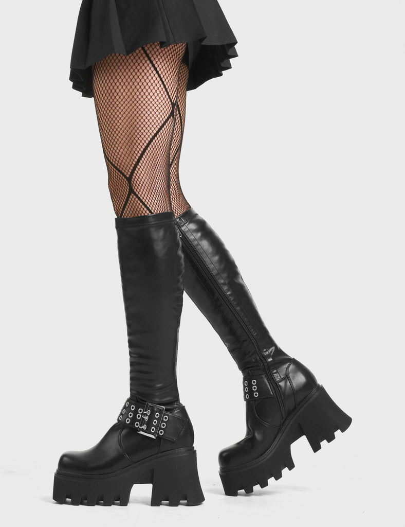Praise You Chunky Platform Knee High Boots in Black. Featuring an adjustable strap  