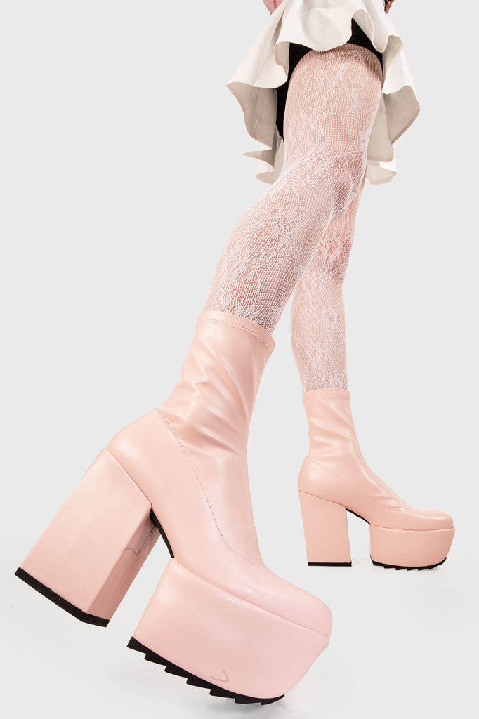 Mini Diva's
 
 Pretty Please Platform Ankle Boots in Pink faux leather. These pink vegan Platform Boots feature on our platform sole, where height meets attitude. Made with eco-friendly materials and 100% cruelty-free, these platform boots are as ethical as they are sassy!
 
 
 - Platform Height: 2 inch
 - Heel Height: 4.8 inch
 - Pink zipper 
 - Platform sole
 - Round Toe
 - 100% vegan 
 
 SKU: LMF 1951 - PinkPU