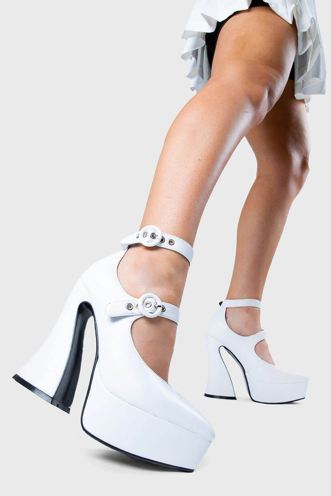 AS SEEN ON CHRISTINE QUINN 

Roamin' Platform Heels in White faux leather. These vegan Platform Heels feature a pointed toe and a Platform sole with a flared heel, perfect for adding height and glam to any outfit. Made with eco-friendly materials and 100% cruelty-free, these Heels are as ethical as they are cute! 


- Platform Height: 1.4 inch
- Heel Height: 5 inch
- Adjustable straps 
- O shaped buckles with silver eyelets
- Platform sole
- Flared Heel
- Pointed toe 
- 100% vegan 

SKU: LMS 494 - White