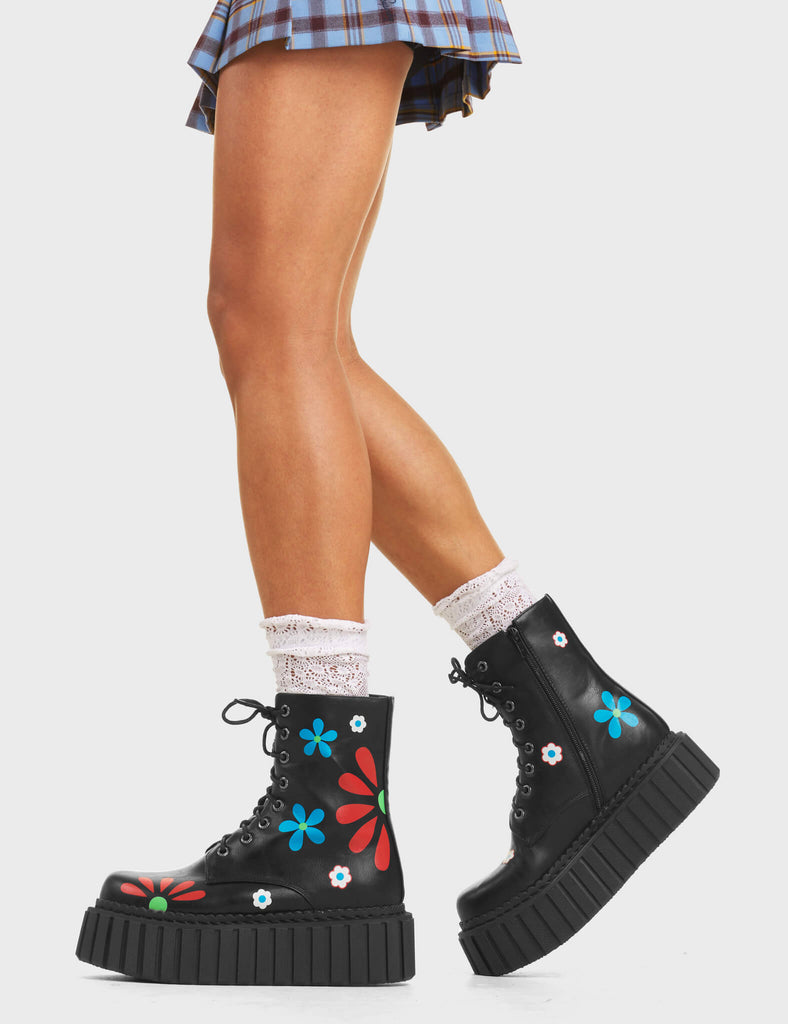 Rocking The Daisies Chunky Ankle Creeper Boots in Black faux leather. Features our iconic flower print on a creeper sole.
