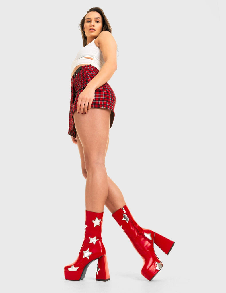 DISCO FEVER 
 
 Seeking Stars Platform Ankle Boots in Red faux leather. These platform boots feature a red boot with silver stars all over. Made with eco-friendly materials and 100% cruelty-free, these platform boots are as ethical as they are chic.
 
 - Platform Height
 - Silver stars
 - Calf length
 - Triangle heel
 - High Heel
 - 100% vegan 
 
 SKU: LMF 3338 - RedPU/SilverStar