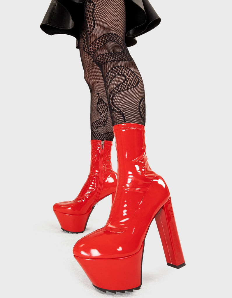 Not Your Basic Boots!  So Sleek Platform Ankle Boots in Red Patent. These platform boots feature a minimalist design with a fitted feel, the perfect way to elevate any outfit. Made with eco-friendly materials and 100% cruelty-free, these platform boots are as ethical as they are eye-catching.  - Platform Height - Heel Height - Red zip - High Heel - Pointed toe - Shark's Teeth Grip - 100% vegan  SKU: LMF 3182 - RedPAT