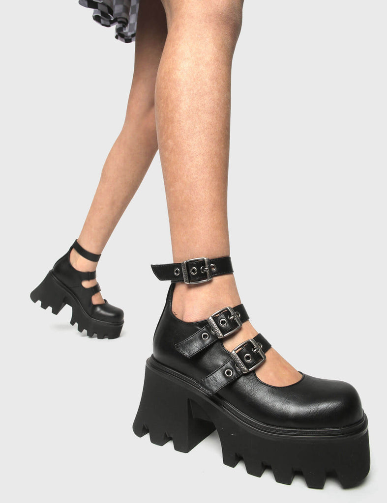 CAN IT GET ANY CUTER?
 
 Sprits Chunky Mary Jane Shoes in Black faux leather. These Mary Janes feature a Chunky and comfortable Platform sole. Everyone needs a pairs of Mary Janes! Made with eco-friendly materials and 100% cruelty-free, these Mary Janes are as ethical as they are cute!
 
 
 - Platform Height: 3.3 inch
 - Adjustable straps
 - Square shaped buckles and silver eyelets
 - Chunky Platform sole
 - Round toe 
 - 100% vegan 
 
 SKU: LMF 1099 - BlackPU