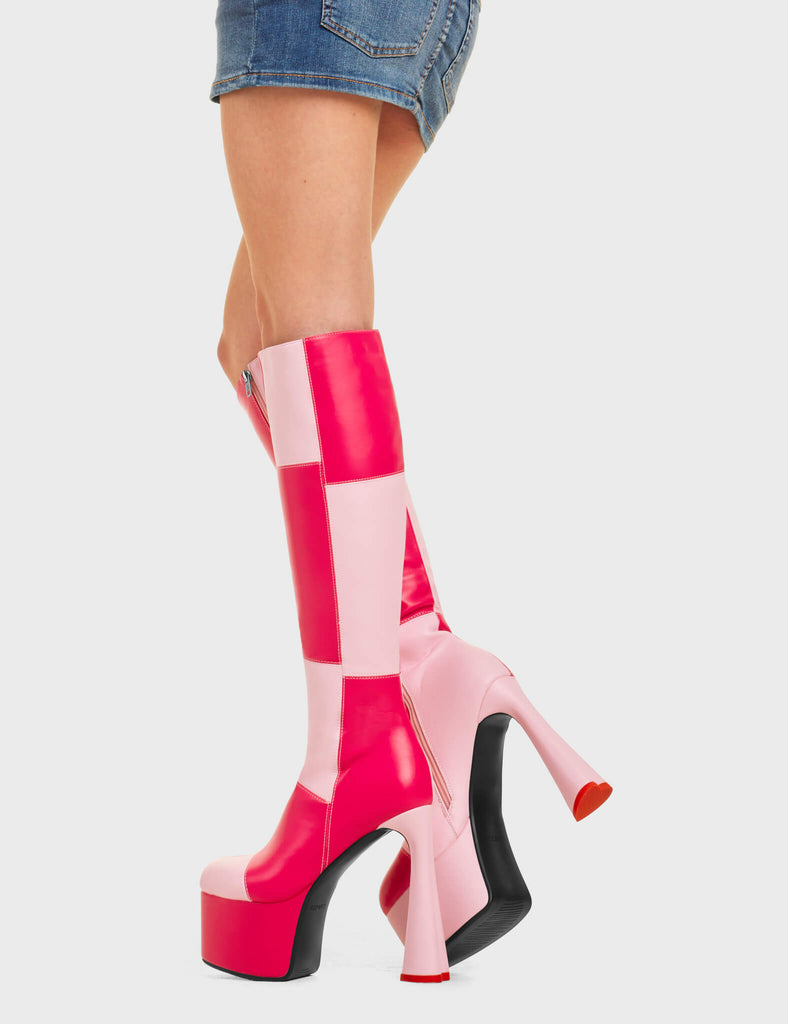 SPLIT SCREEN
 
 Sweet Tooth Platform Knee High Boots in Pink and Fuchsia faux leather. These platform boots feature a pink and fuchsia patch work design with a heart shaped heel and a red heart at the bottom. Made with eco-friendly materials and 100% cruelty-free, these platform boots are as ethical as they are chic.
 
 - Platform Height
 - Knee high length
 - Patch work design
 - Heart heel
 - Red Heart
 - High Heel
 - 100% vegan
 
 SKU: LMF 4474 - PinkPU/FuchsiaPU