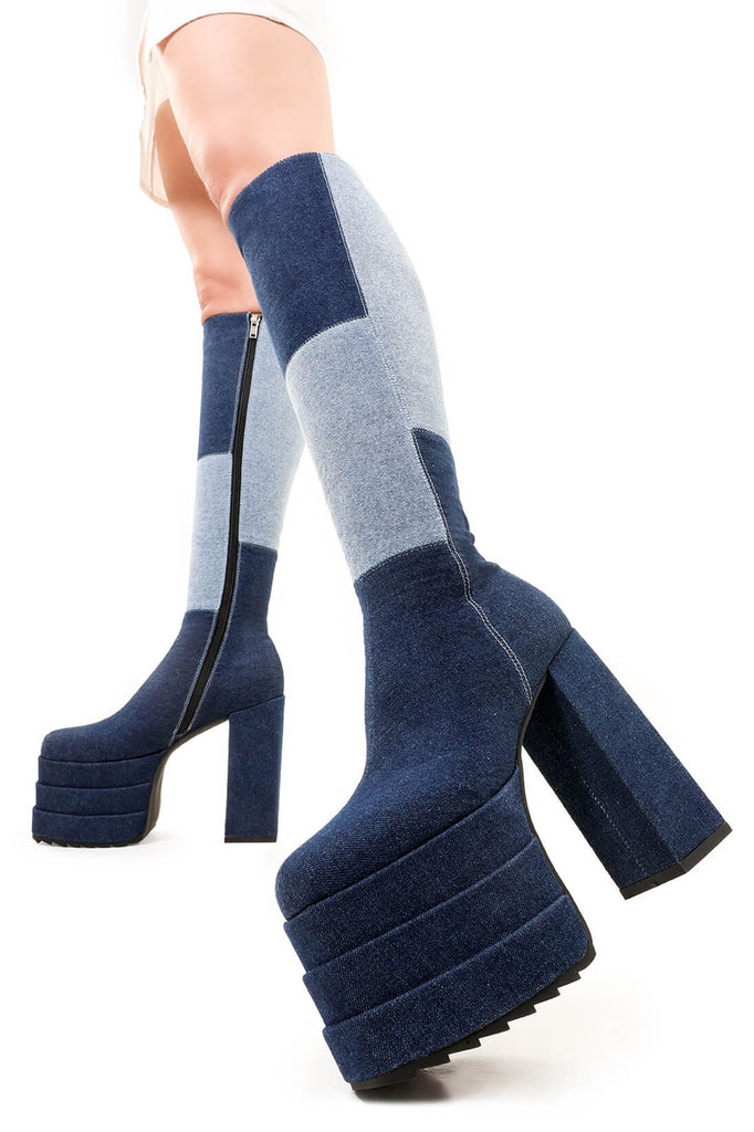 Denim Dolls
 
 Talk Of The Town Platform Knee High Boots in Denim. These platform boots feature our iconic Denim finish on a double stack platform sole, take center stage with these jaw dropping boots. Made with eco-friendly materials and 100% cruelty-free, these platform boots are as ethical as they are Jaw dropping.
 
 - Platform Height
 - Heel Height
 - Black Zip 
 - Knee high length
 - Shark's teeth grip
 - Chunky Platform sole
 - Round Toe 
 - 100% vegan 
 
 SKU: LMF 2701 - Denim
