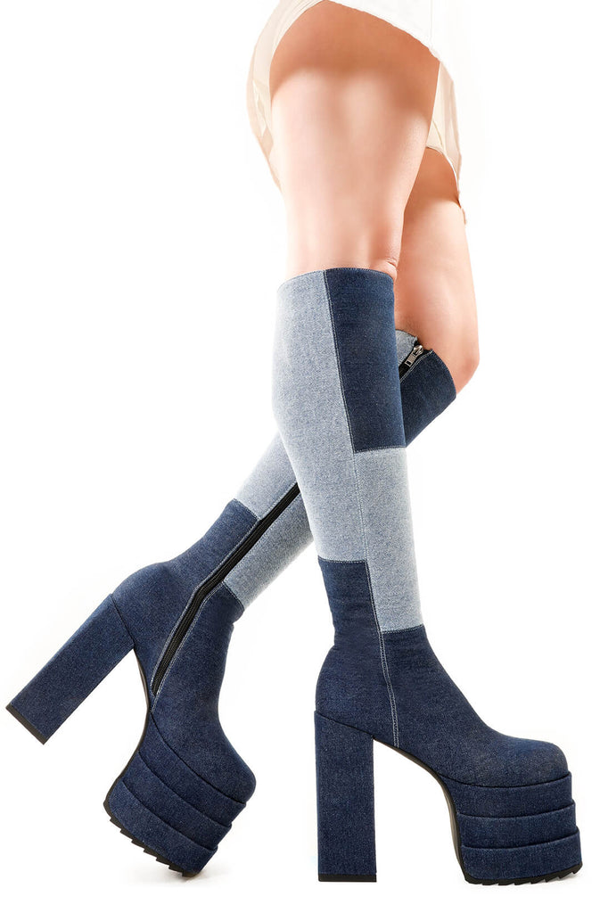 Denim Dolls
 
 Talk Of The Town Platform Knee High Boots in Denim. These platform boots feature our iconic Denim finish on a double stack platform sole, take center stage with these jaw dropping boots. Made with eco-friendly materials and 100% cruelty-free, these platform boots are as ethical as they are Jaw dropping.
 
 - Platform Height
 - Heel Height
 - Black Zip 
 - Knee high length
 - Shark's teeth grip
 - Chunky Platform sole
 - Round Toe 
 - 100% vegan 
 
 SKU: LMF 2701 - Denim