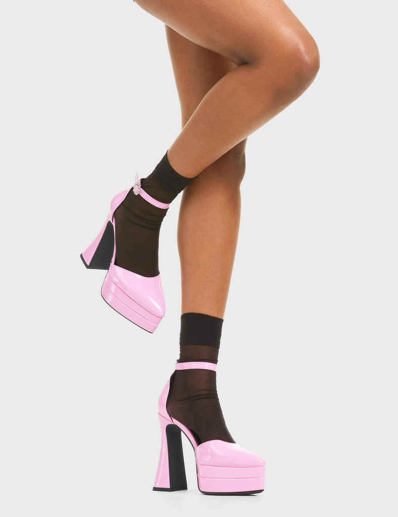 CATWALK READY  Tear of Joy Platform Heels in Pink patent. These platform boots feature a minimalist look with a flared heel, keeping it nice and classy. Made with eco-friendly materials and 100% cruelty-free, these platform boots are as ethical as they are chic.  - Platform Height - Adjustable strap - Flared heel - Pointed toe - High Heel - 100% vegan  SKU: LMF 3525 - PinkPAT