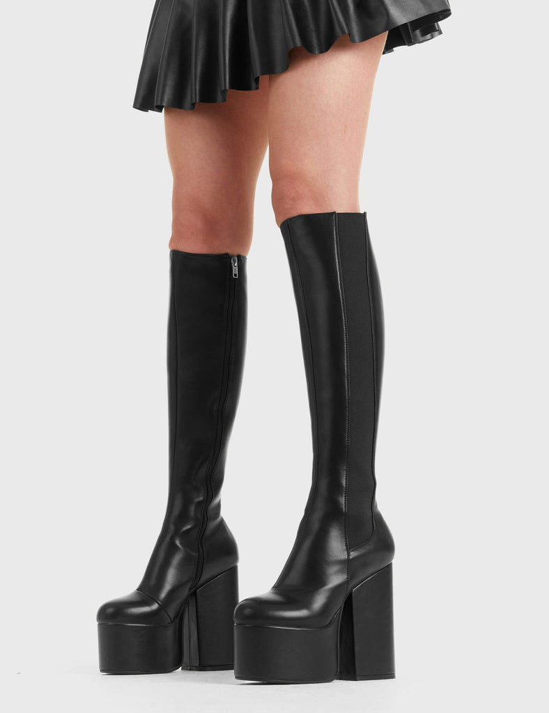 Yas Queen!
 
 Timer Platform Knee High Boots in Black faux leather. These black platform boots feature on our high platform sole with stretchy gusset detail, making a statment with eyery step. Made with eco-friendly materials and 100% cruelty-free, these platform boots are as ethical as they are Perfect!
 
 - Platform Height
 - Heel Height
 - Knee high lengh
 - Black Zipper
 - Stretchy gusset detail
 - Wide ankle and calf friendly
 - High Platform sole
 - Round Toe 
 - 100% vegan 
 
 SKU: LMF 2257 - BlackPU