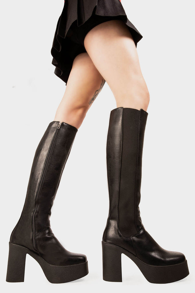 THE TRENDING ONE

Yes Boss Platform Knee High Boots in Black faux leather. These Black vegan Boots feature an elegant clutter free design and a  Platform sole and heel, perfect for adding height and style to any outfit. Made with eco-friendly materials and 100% cruelty-free, these boots are as ethical as they are stylish.


- Platform Height: 1.25 inch
- Heel Height: 4 inch
- Knee High length
- Black zipper 
- Black elastic gusset
- Platform sole
- Square toe 
- 100% vegan 

SKU: LMF 1251 - BlackPU